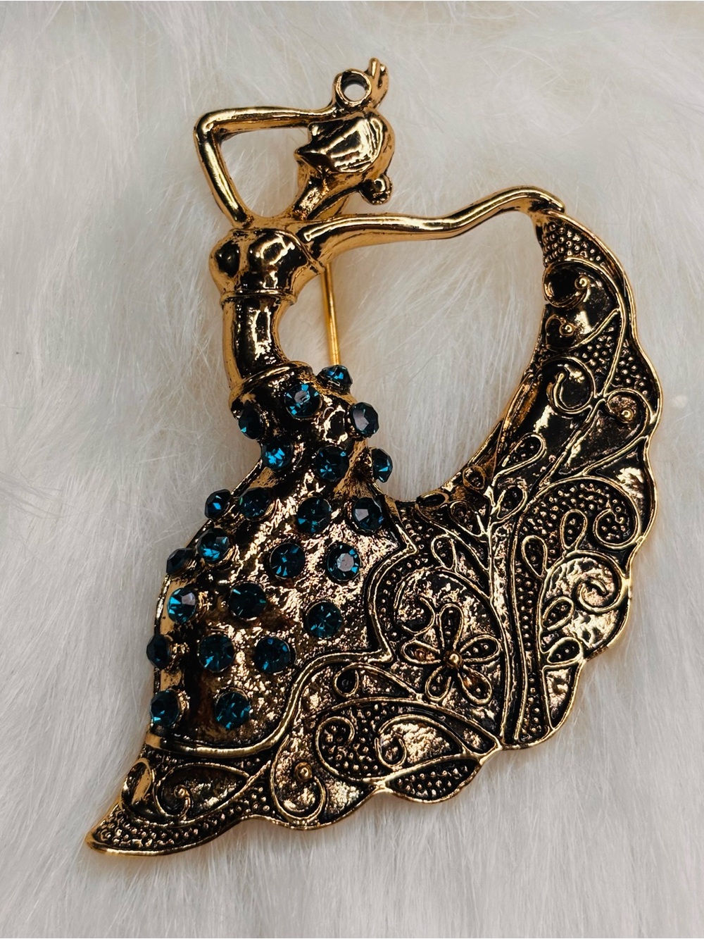 Large Gold-Tone Dancing Woman Brooch with Blue Rhinestones